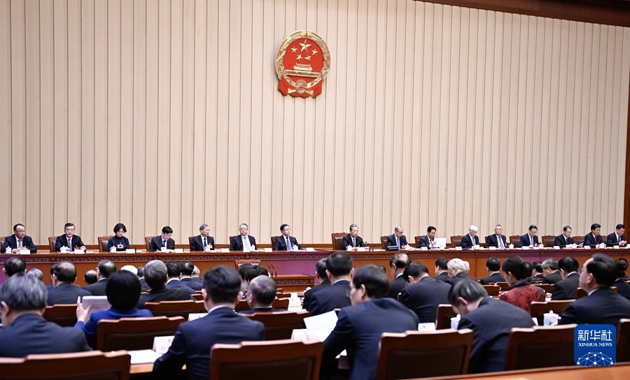 3月10日，十四屆全國人大二次會議主席團在北京人民大會堂舉行第三次會議。主席團常務主席趙樂際主持會議。新華社記者 謝環馳 攝