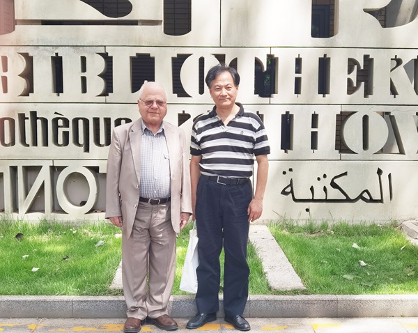 納比勒·蘇萊曼(左)與薛慶國(guó)